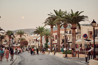 Group of people walking on street