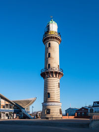 Low angle view of building against blue sky