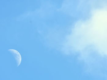 Low angle view of moon in sky