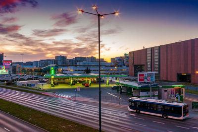 High angle view of city street against sky during sunset