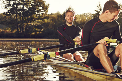 Young men canoeing