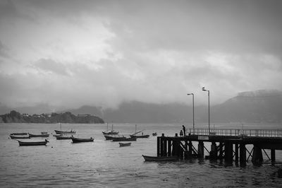 Pier on sea against sky