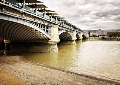 Arch bridge over river