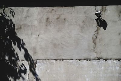 Low angle view of clothes hanging on wall