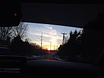 Road passing through forest