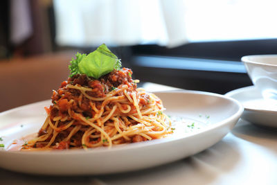 Close-up of noodles in bowl on table