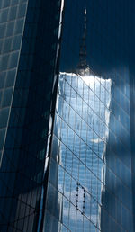 Low angle view of modern building against sky