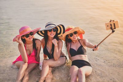 Friends enjoying at beach