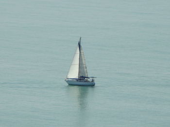 Sailboat sailing on sea