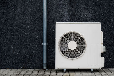 Condensing unit on building facade, denmark