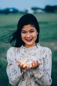 Portrait of a smiling young woman