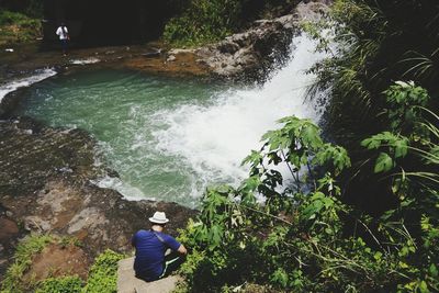 Woman standing on rocks