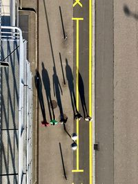 Directly above shot of people on sidewalk