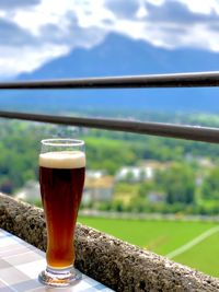 Close-up of beer glass on table