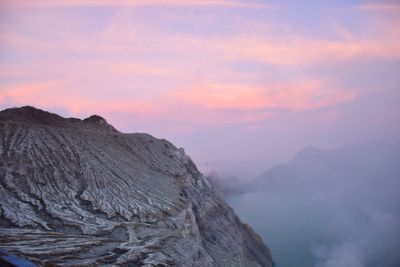 Scenic view of mountains against sky during sunset