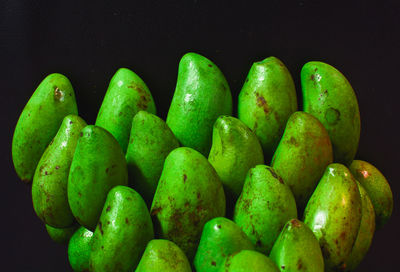 Close-up of fruits on black background