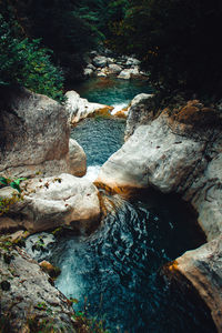 High angle view of river amidst rock formation