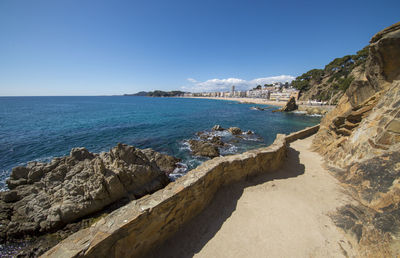 Scenic view of sea against clear blue sky