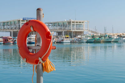 Bright lifebuoy on the background of the marina, cyprus, limassol