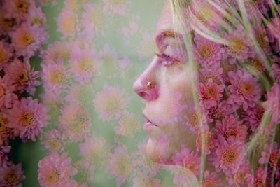 Double exposure headshot of young woman and flowers