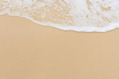 High angle view of sand on beach