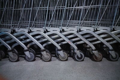 Shopping carts by walkway