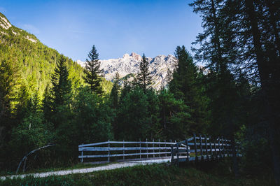 Scenic view of mountains against blue sky