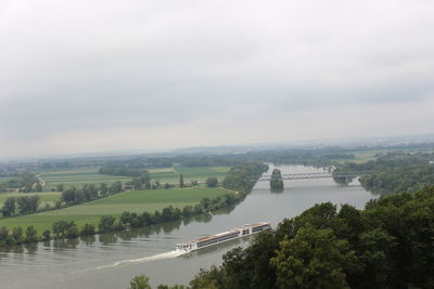 High angle view of bridge over river against cloudy sky