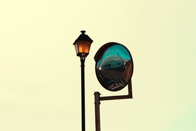 Low angle view of street light against clear sky