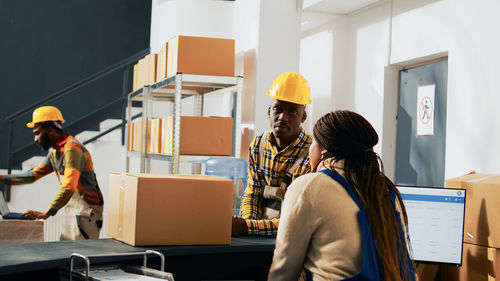 Side view of man working at office