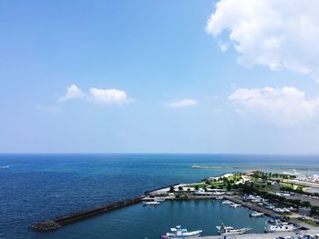 High angle view of harbor in sea against sky