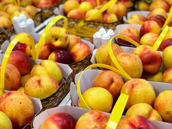 Full frame shot of peaches for sale at market stall