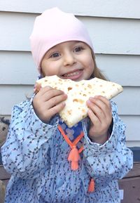 Portrait of cute girl eating ice cream