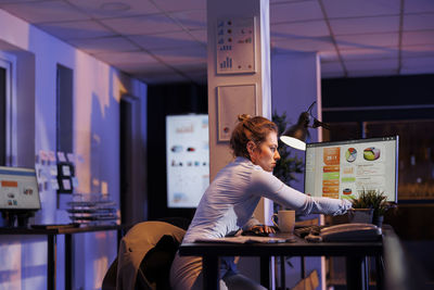 Portrait of businesswoman working in creative office