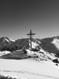 Scenic view of snow covered mountain against sky