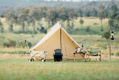 Tent on field against sky