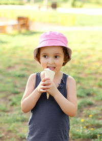 Portrait of girl holding ice cream