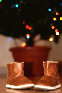 Close-up of illuminated christmas tree at home