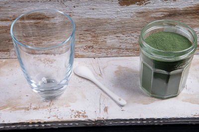 High angle view of drink in glass on table