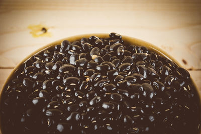 Close-up of coffee beans on table