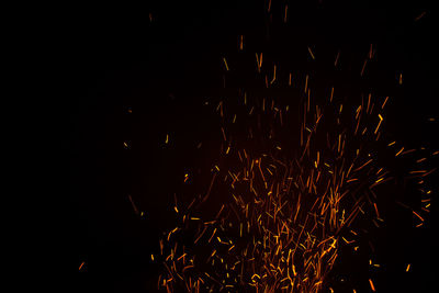 View of firework display at night