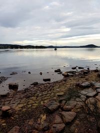 Scenic view of beach against sky