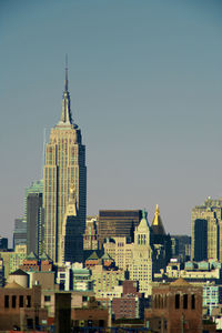 View of modern buildings against clear sky