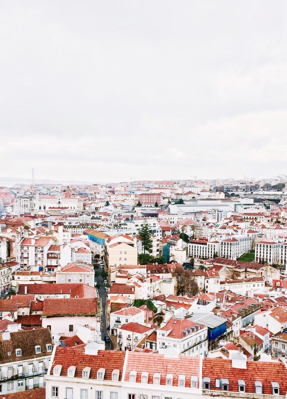 building exterior, architecture, built structure, residential structure, residential district, residential building, city, roof, house, crowded, sky, cityscape, high angle view, town, townscape, day, cloud - sky, outdoors, overcast, no people