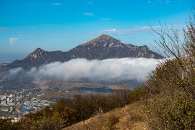 Scenic view of volcanic mountain against sky