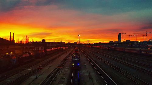 High angle view of train against sky during sunset