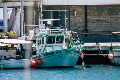 Boats moored in sea