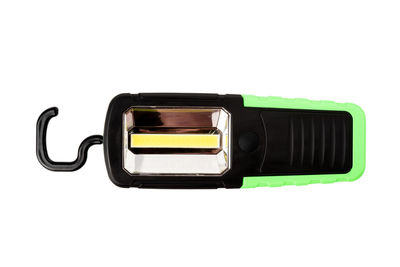 Close-up of telephone booth against white background