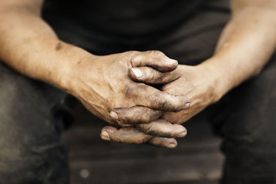 Close-up of mans hands