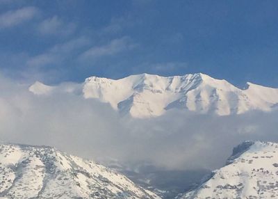 Scenic view of snowcapped mountain against sky